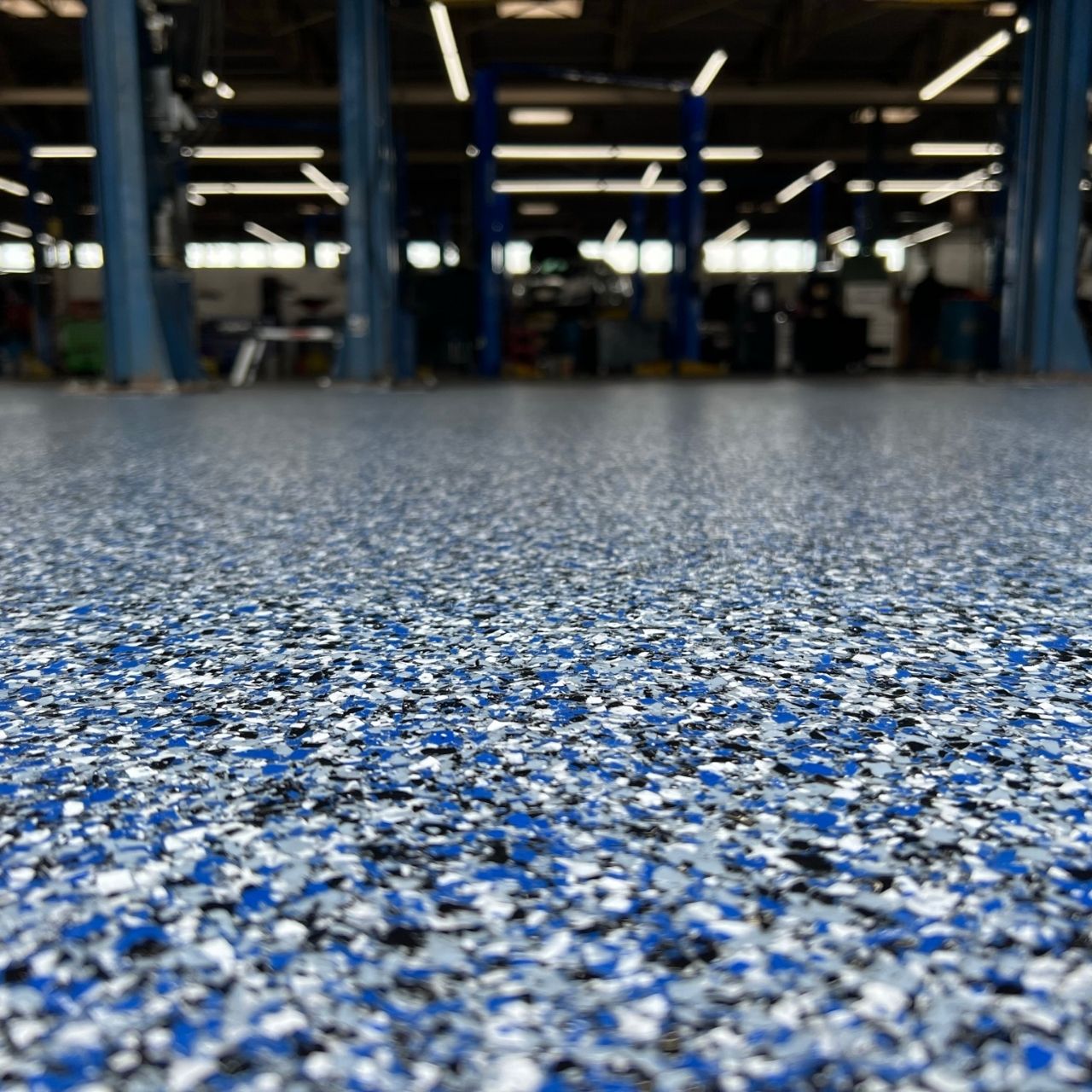 Auto shop showroom floor coating Osage Beach MO — Shipp-Mates Epoxy of the Ozarks