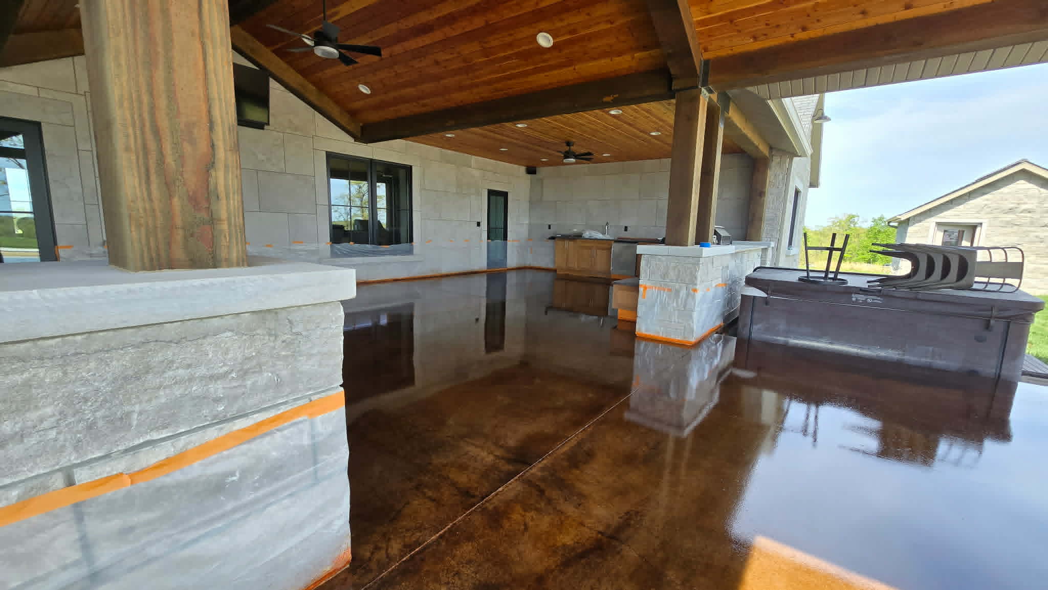 Acid stained concrete covered pavilion and outdoor kitchen - Shipp-Mates Epoxy of the Ozarks Osage Beach MO
